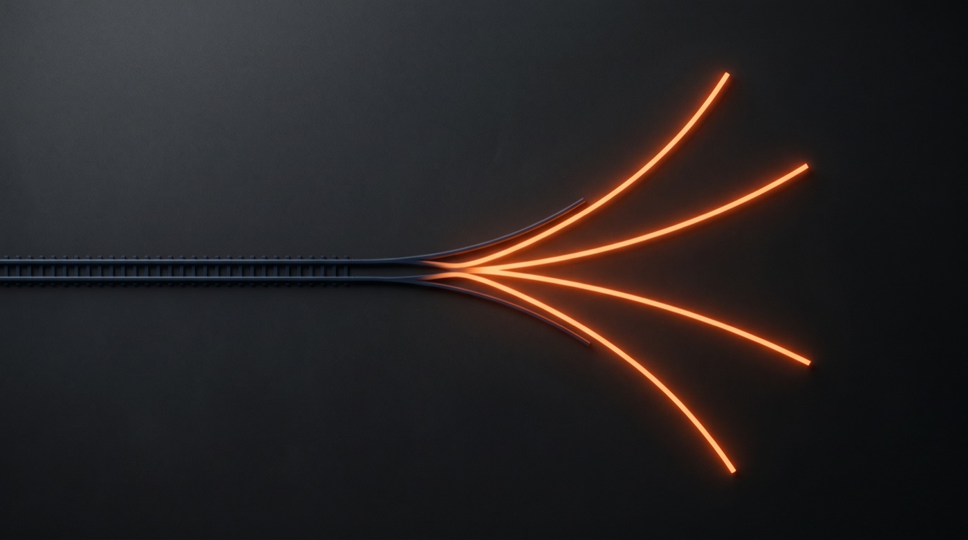 A straight dark track smoothly splitting midway into several glowing orange paths